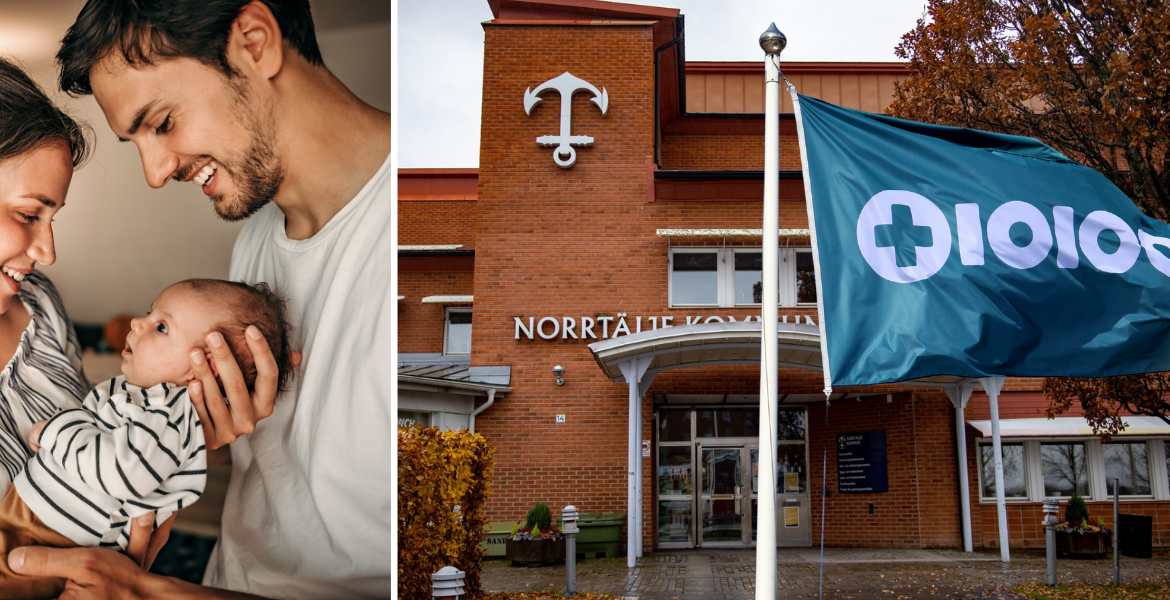 En familj bredvid Norrtäljes kommunhus inklusive en flagga för Tiohundra.